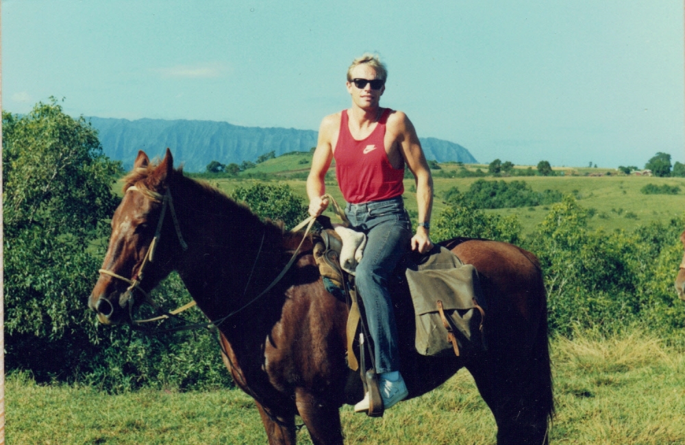 Schuyler Hoffman horseback riding in Hawaii