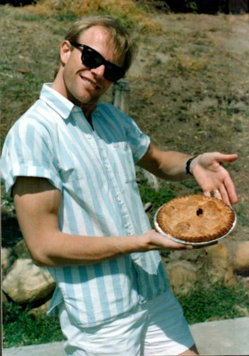 Me with big biceps and an apple pie