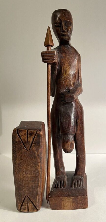 Example of a warrior wood carving with a huge penis