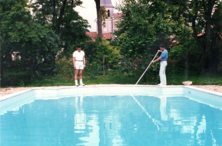 Jean-Francois and Patrick Clean the pool in Pallaud