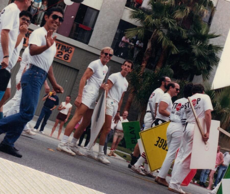 Sky Hoffman & Scott Zucker marching with Stop AIDS Orange County in the Long Beach, CA Pride Parade