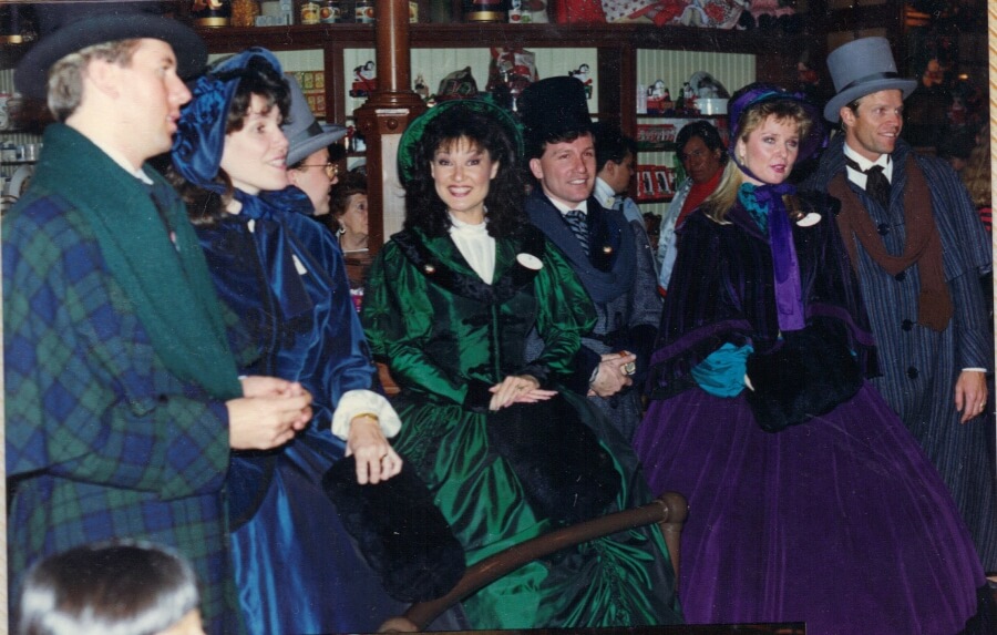 Sky Hoffman singing with the Dickens Carolers at Disneyland