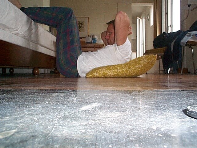 Schuyler Hoffman doing his morning workout in his apartment in Paris