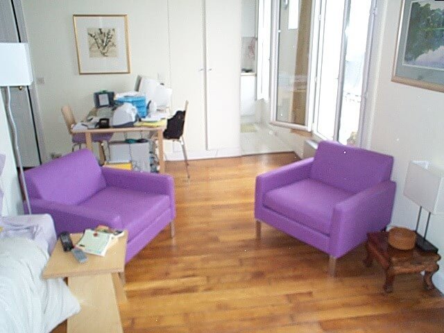 The purple sitting chairs in Schuyler Hoffman's apartment in Paris