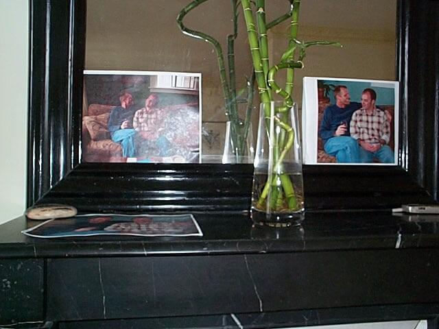 Photos of Schuyler Hoffman & David Peterson on the mantle in Schuyler Hoffman's apartment in Paris