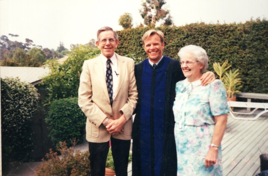 A happy Schuyler Hoffman with his mom and dad after graduating from law school